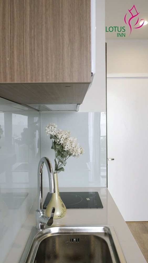 Фото Lotus Inn Serviced Apartment