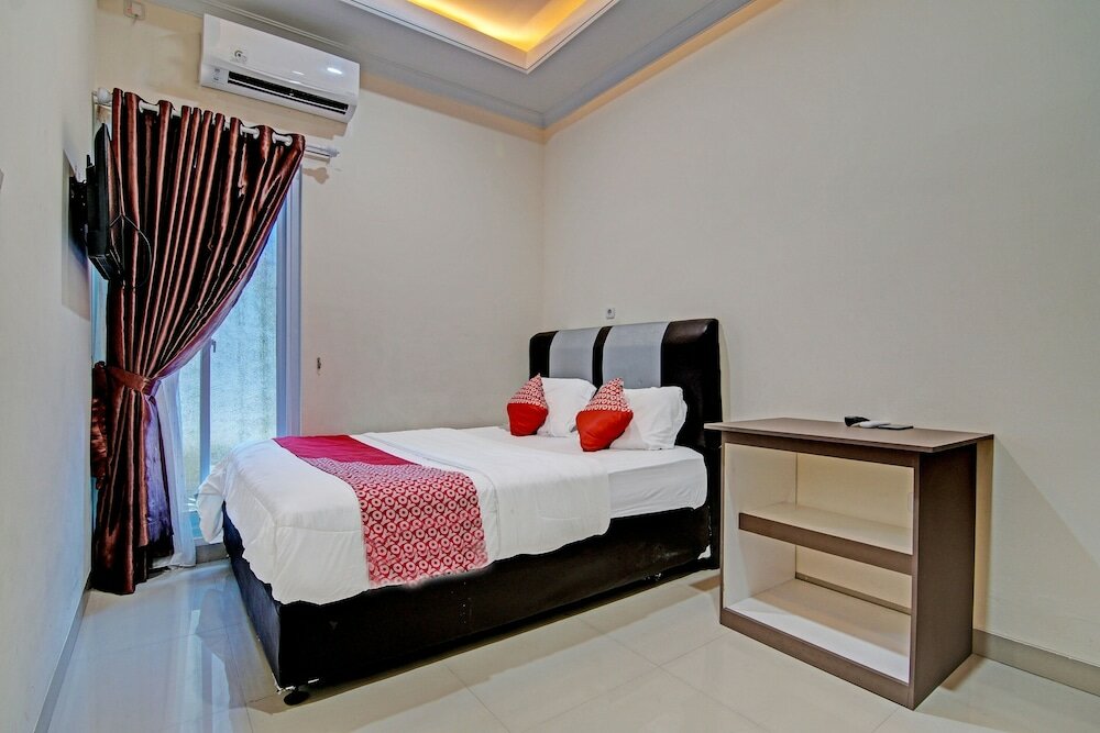 Фото Oyo 91269 R&s Living Residence