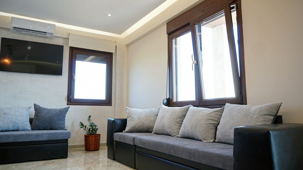 Фото Sinodinos Deluxe Apartments