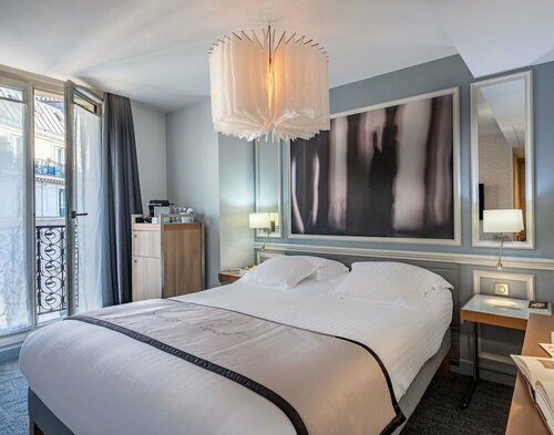 Гостиница Hôtel Littéraire Le Swann BW Premier Collection в Париже