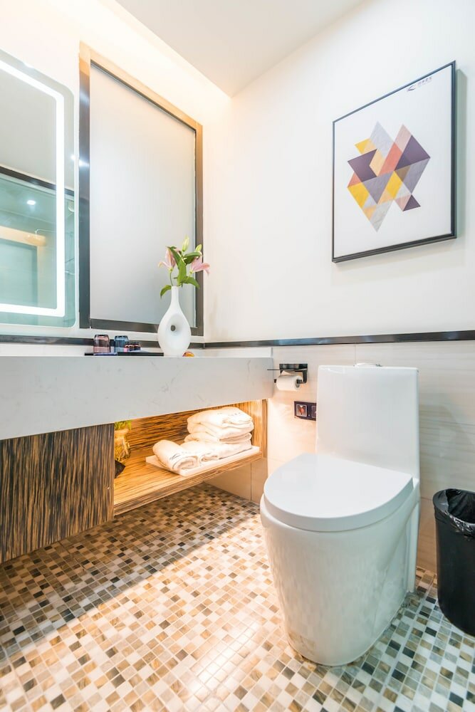 Фото Tengchong Soft Time Hotel