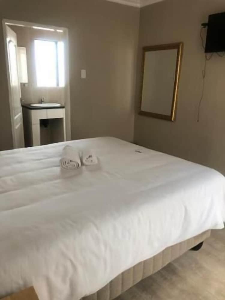 Фото Kennzy Guesthouse