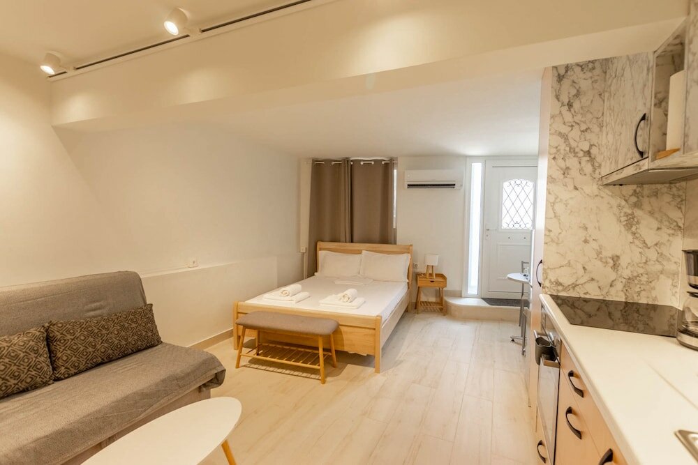 Фото Athens Plaka Family Suites