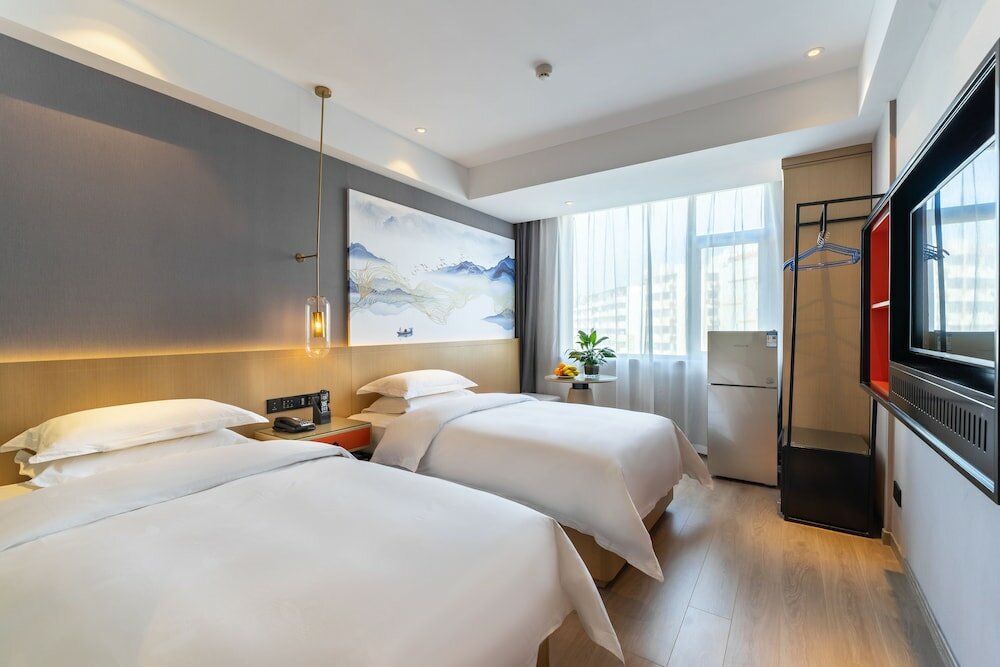 Фото Yì Wū Shì Bó Yì Měi Jū Hotel