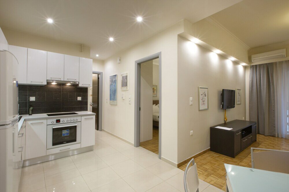 Фото Koukaki Deluxe Apt at Syggrou-Fix