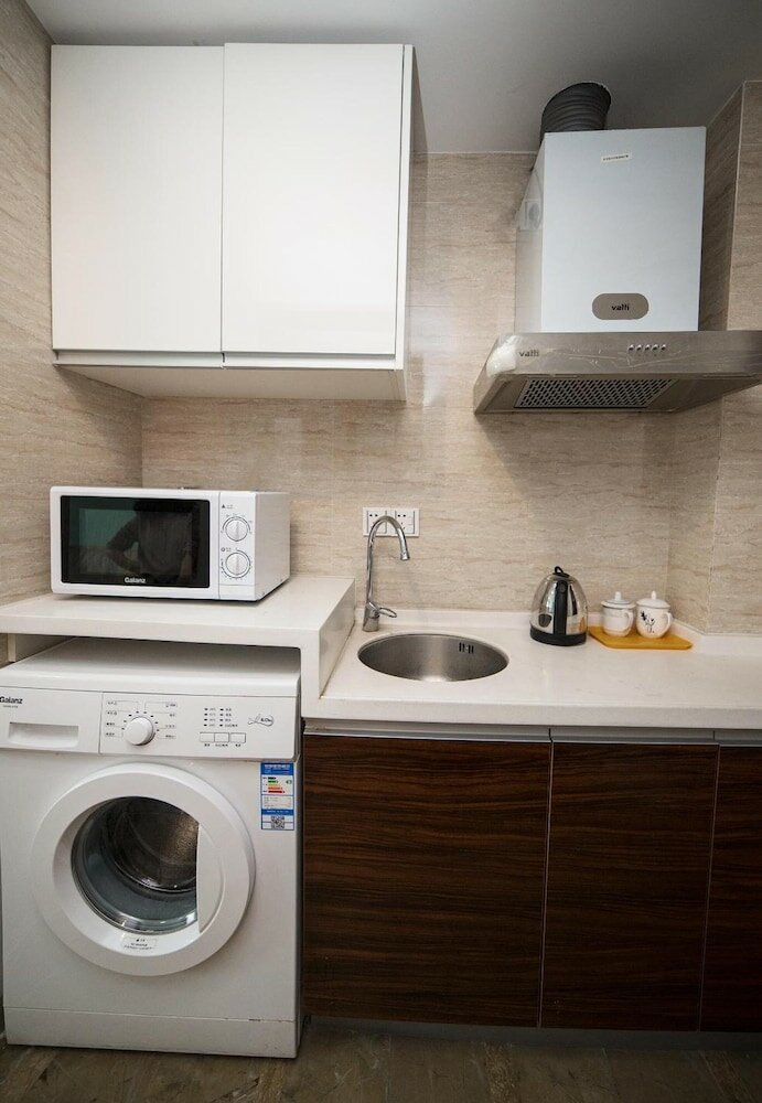 Фото Yue Ke Apartment