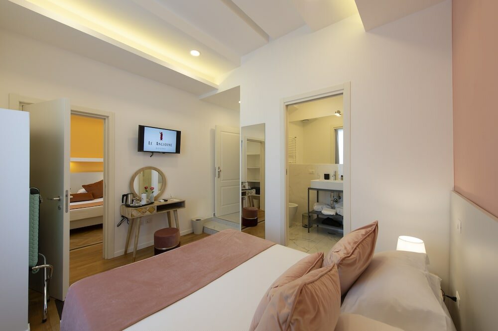 Фото Le Angioine Rooms
