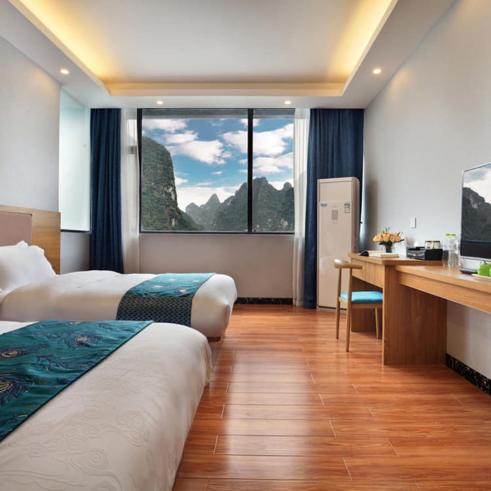 Фото Yangshuo Qingyunge Hotel