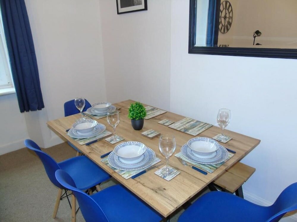 Фото Snug - Sealladh Mara Apartment