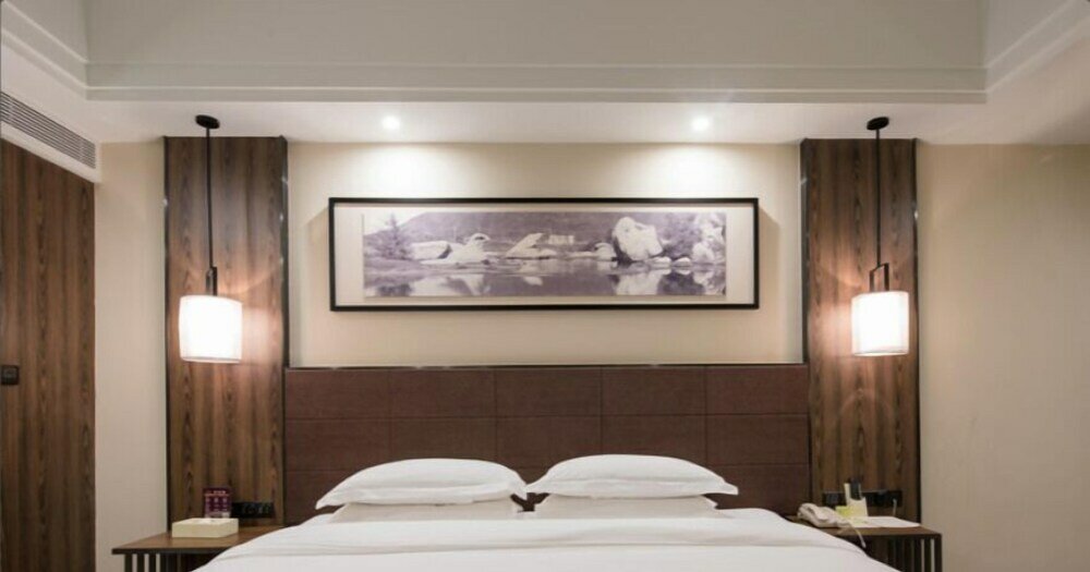 Фото Auden International Hotel