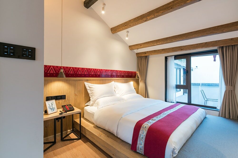 Фото Heyue moxie Hotel Lijiang