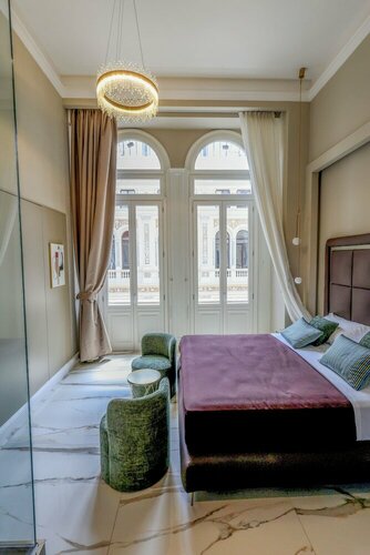 Гостиница Maison San Carlo Luxury Suites в Неаполе