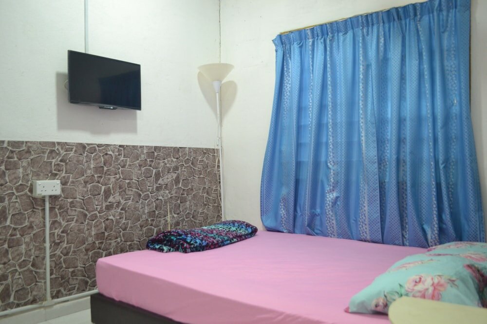 Фото Spot On 89821 Batu Maung Sempoi Inn And Cafe