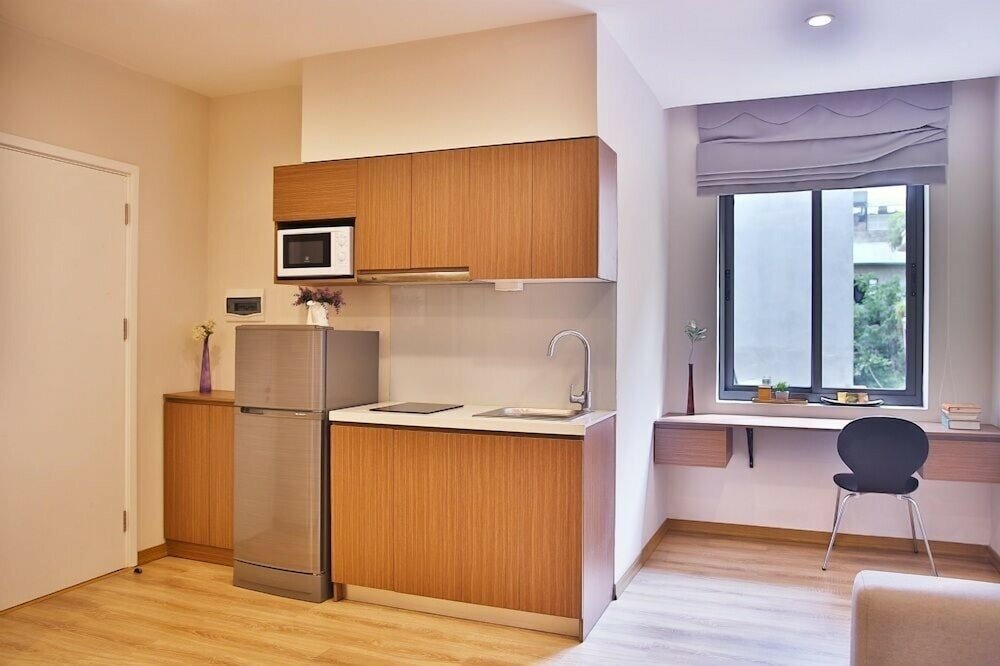 Фото Lotus Inn Serviced Apartment