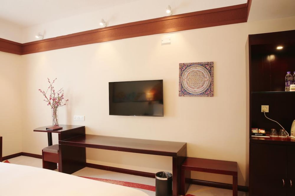 Фото Ramada Encore DaochengYading