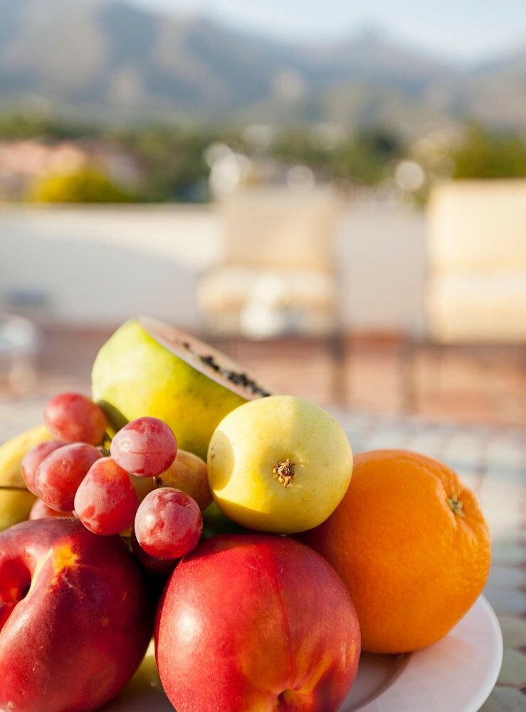 Фото Apartamentos Guadalpin Boutique