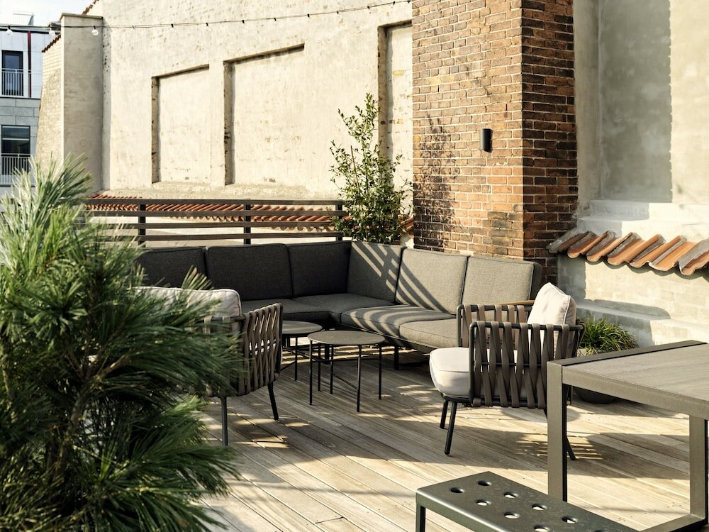 Фото Apēron Apartment Hotel