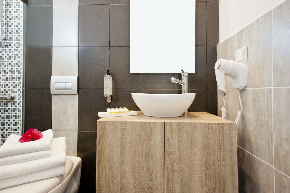 Фото Colosseo Studios & Apartments