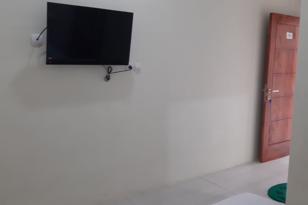 Фото Oyo 90299 Corner Guest House