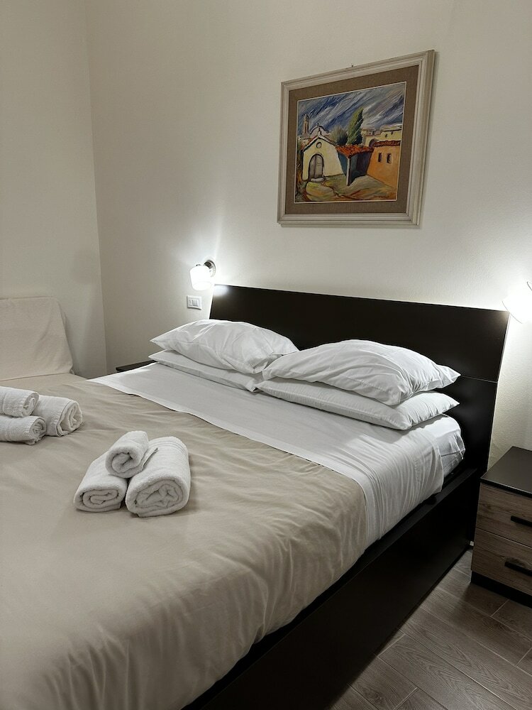 Фото Domo Achenza Guesthouse