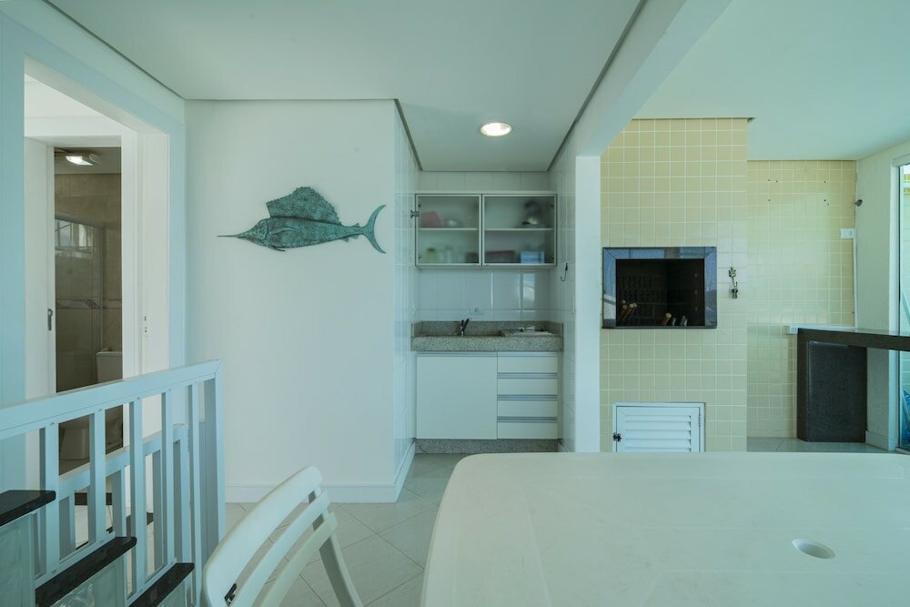 Фото 921 - Tríplex Beira Mar 4 suítes