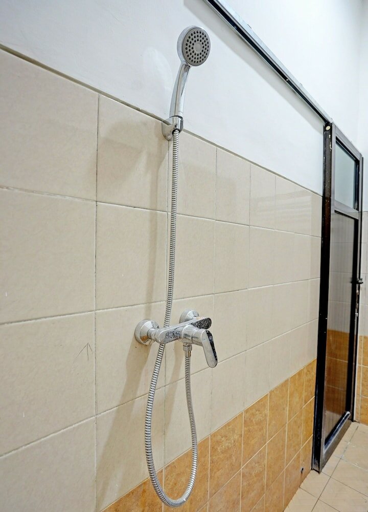 Фото OYO 92435 Sunlo Cozy Home Family Homestay Syariah