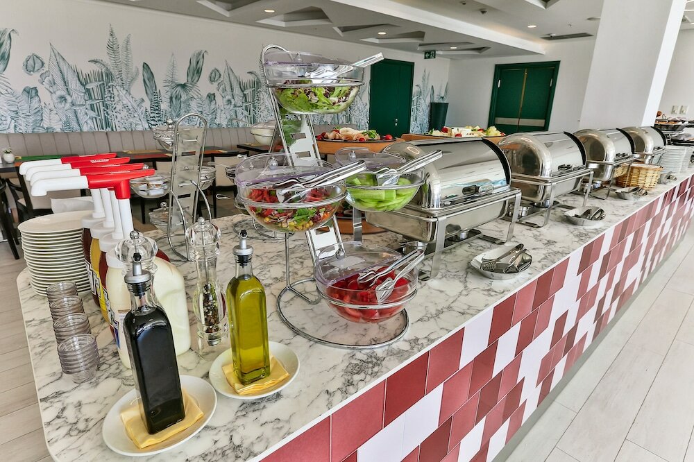 Фото Hotel Tq Plaza