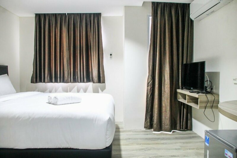 Гостиница Comfy Studio Room Bintaro Icon Apartment