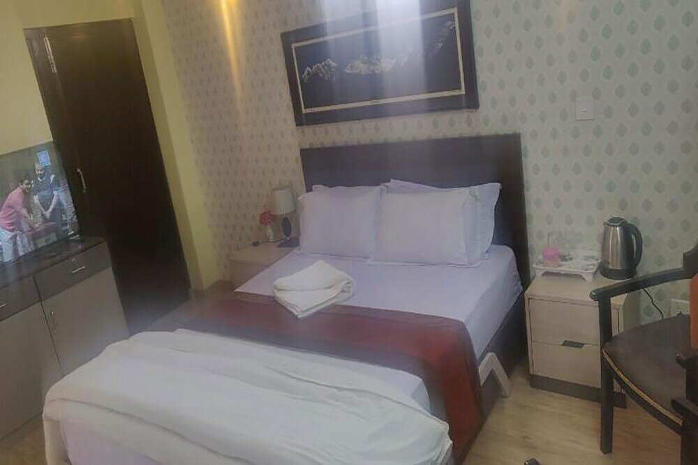 Фото Samakhusi Deluxe Apartment