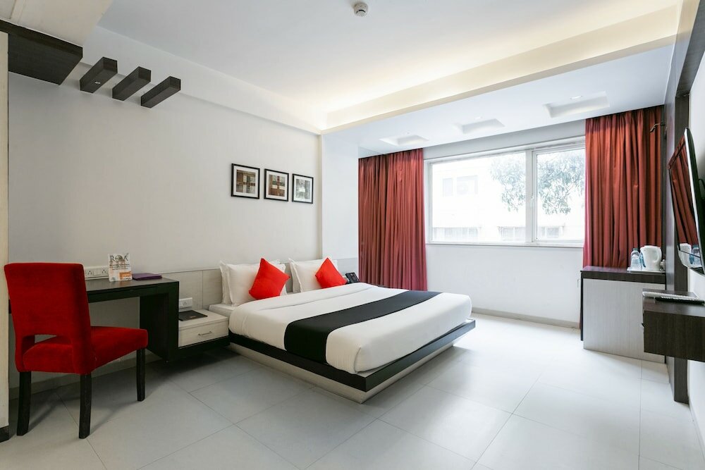 Фото Capital O 45587 The Roa Hotel