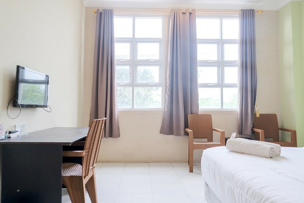 Фото Urbanview Hotel Ta Ke Jelutung Jambi