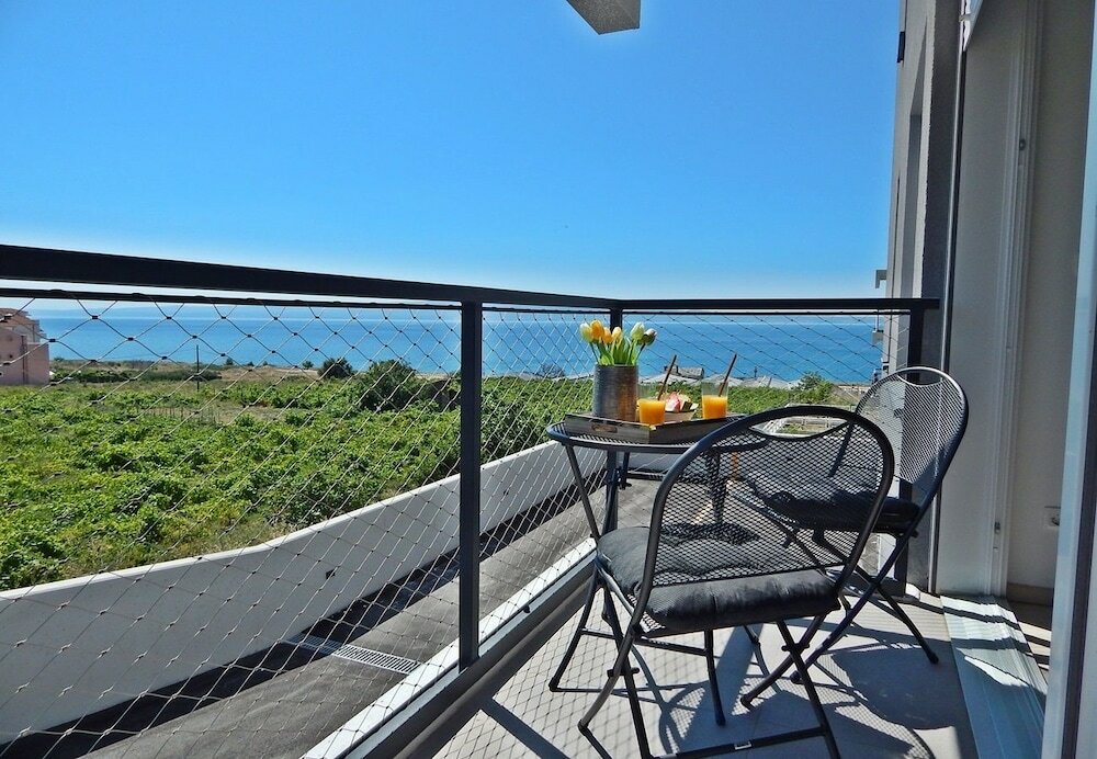 Фото StellaMare Apartments