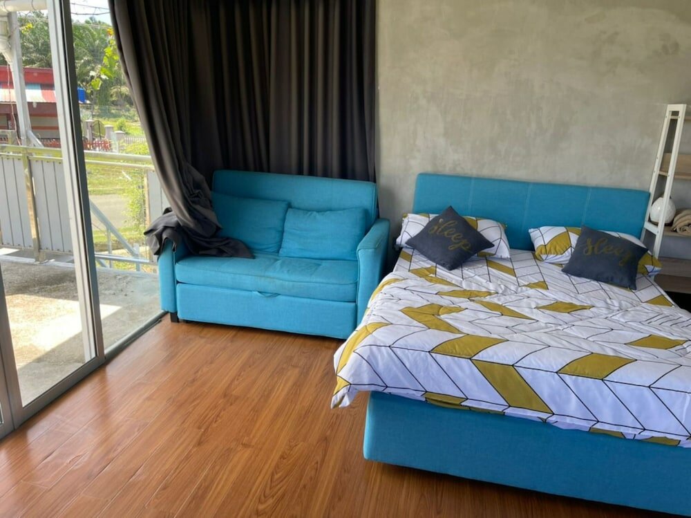 Фото Oyo Home 90370 D'tampi Homestay