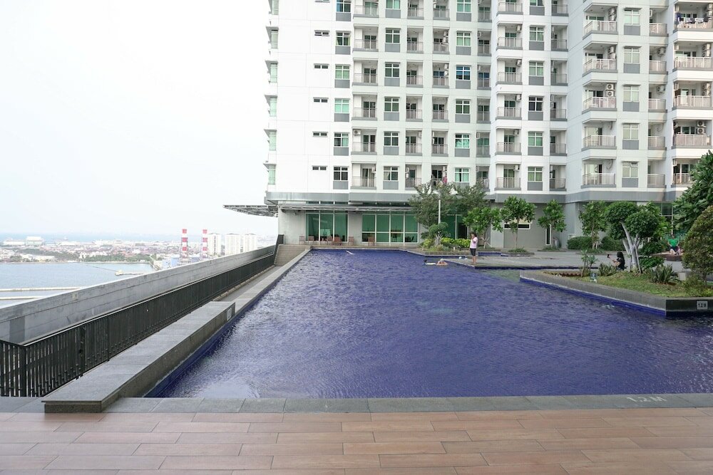 Фото Homey 1br with City View Green Bay Apartment