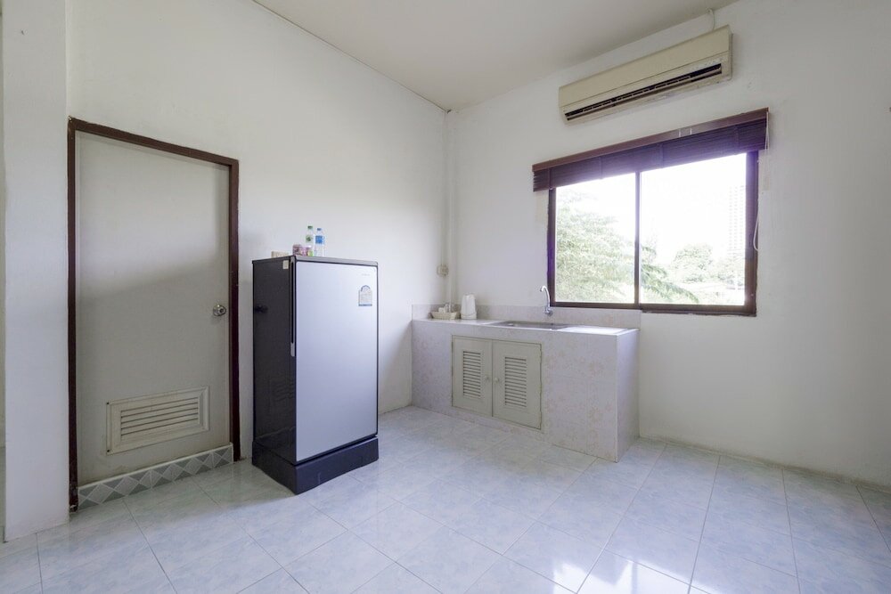 Фото Oyo 1165 Uma Apartment