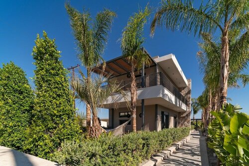 Гостиница Palmeral Luxury Suites в Кремасти
