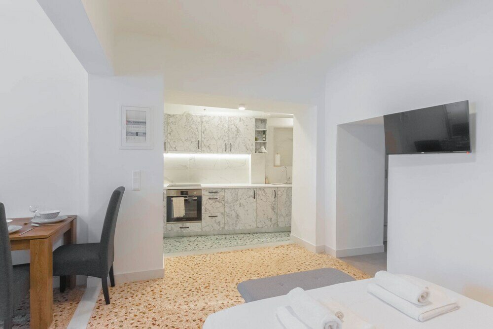 Фото Athens Plaka Family Suites