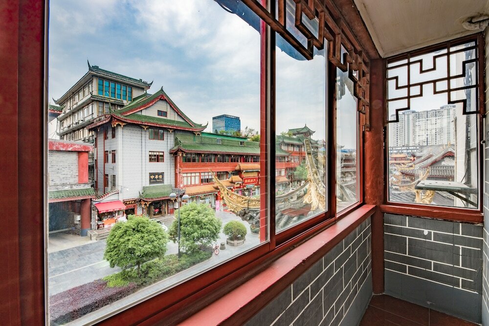 Фото Chengdu Wenjun courtyard Hotel