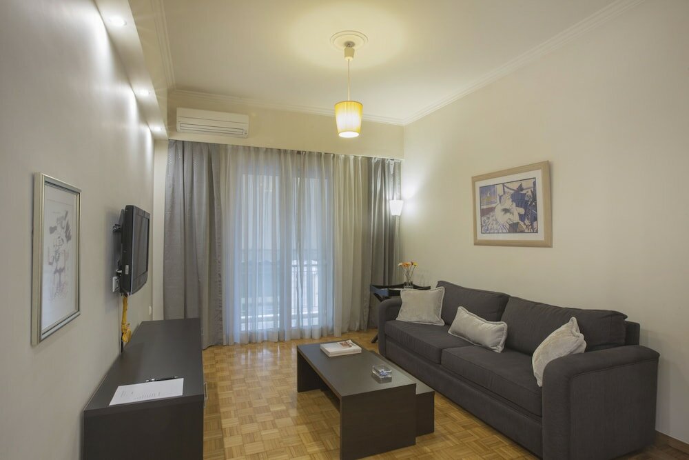 Фото Koukaki Deluxe Apt at Syggrou-Fix