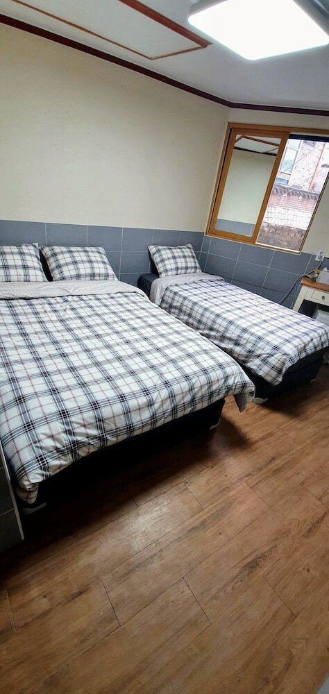 Фото New Sun Guesthouse Myeongdong