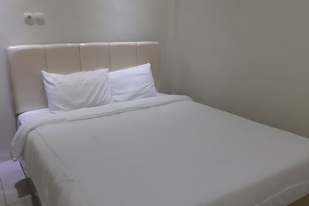 Фото Oyo 90299 Corner Guest House