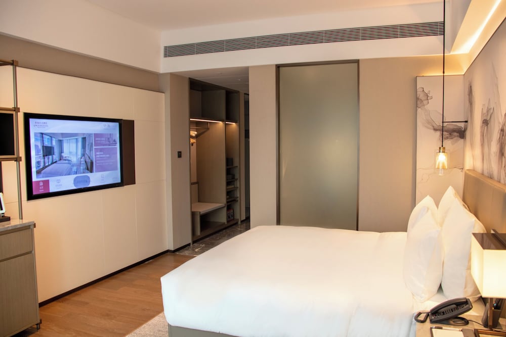 Фото Ln Dongfang Hotel Pazhou