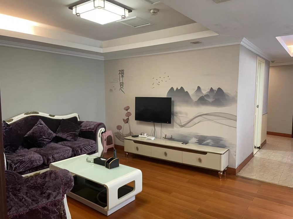 Фото Yoyo International Apartment