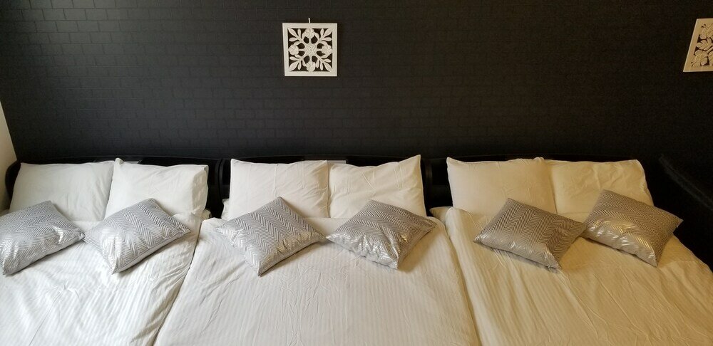 Фото Guesthouse Daikokucho Ekimae