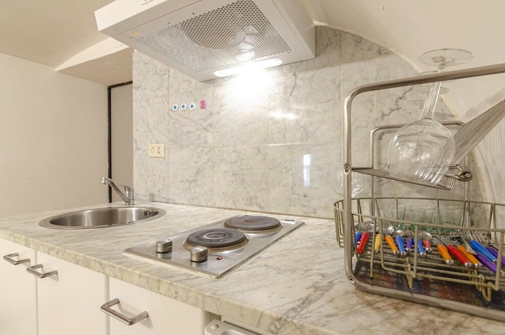 Фото Fossalta 1 Amm - Appartamento Piccolo nel Cuor