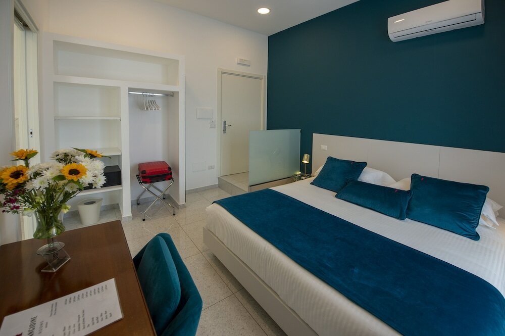 Фото Le Angioine Rooms