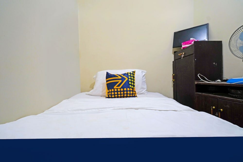 Фото Spot On 91783 Urban Syariah Residence