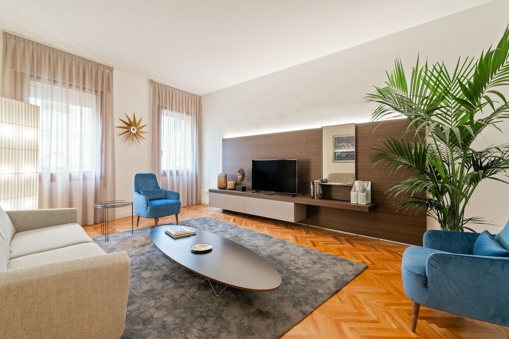 Фото San Fermo Luxury Apartment