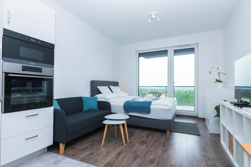 Фото WaterFront City Apartments by UrbanRent