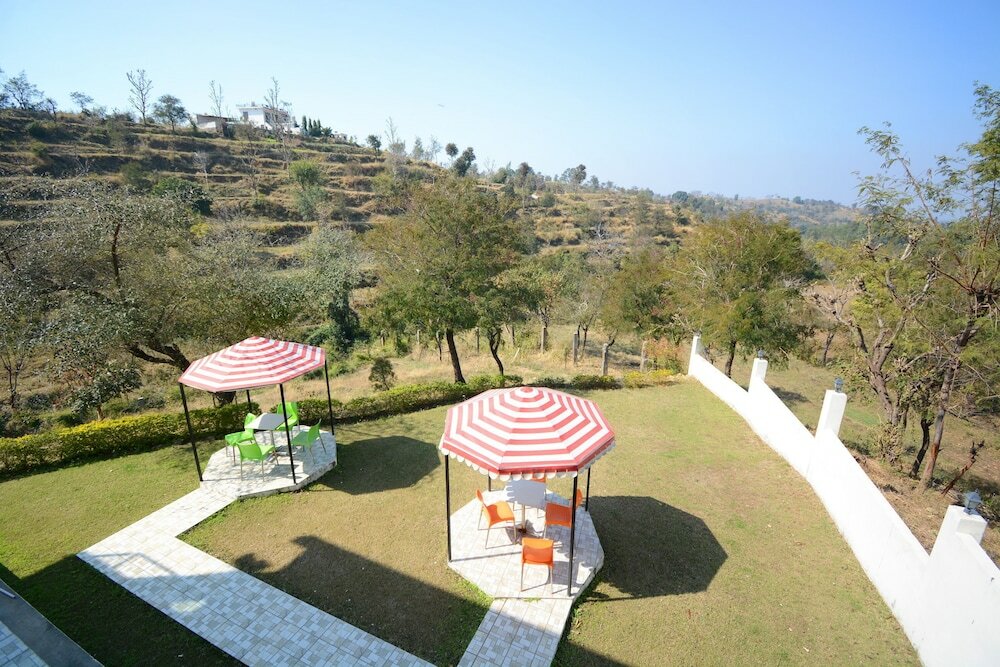 Фото Oyo 29284 Nirvana Cottages